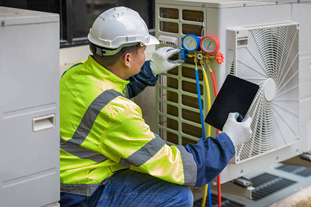 Professional Emergency Ac Repair technician working in Ballston Spa, NY